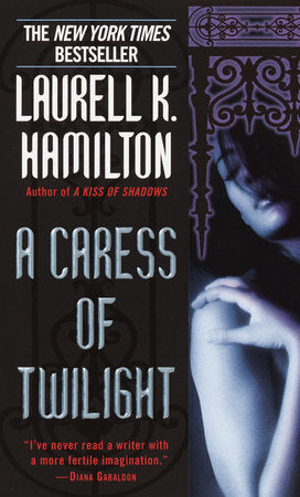 A Caress of Twilight Paperback by Laurell K. Hamilton