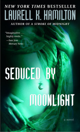 Seduced by Moonlight Paperback by Laurell K. Hamilton