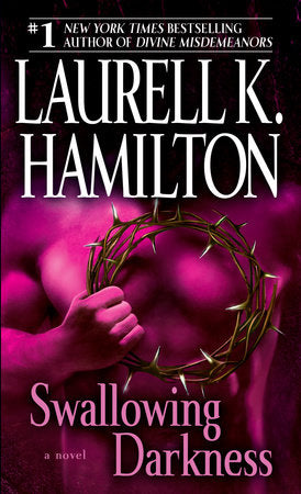 Swallowing Darkness Paperback by Laurell K. Hamilton