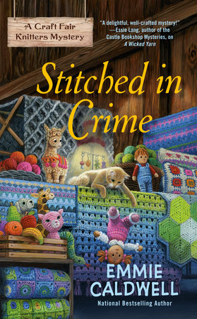 Stitched in Crime Paperback by Emmie Caldwell