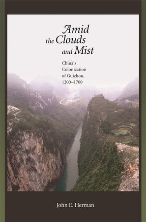 Amid the Clouds and Mist Hardcover by John E. Herman