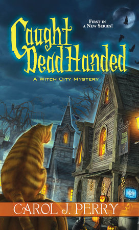 Caught Dead Handed Paperback by Carol J. Perry