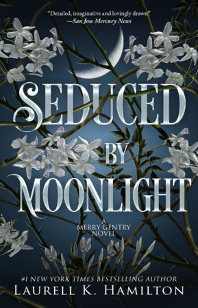 Seduced By Moonlight Paperback by Laurell K. Hamilton